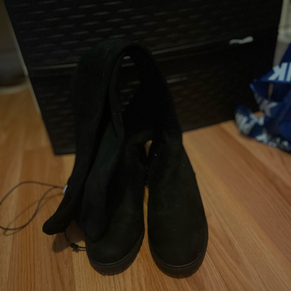 Knee length boots